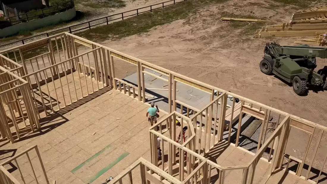 Aerial view of a new build being framed