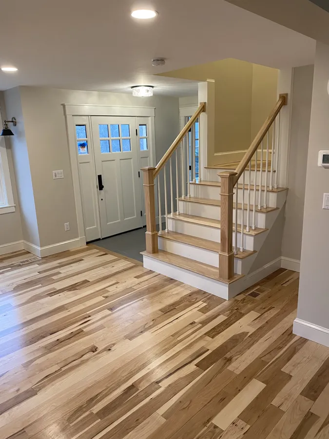 Hickory floor entry with new staircase